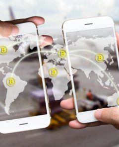 Two Businessman hands holding smartphones. Fintech concept , Peer-to-peer , logistic , blockchain , bitcoin concept with map and world connect , airplane in airport abstract background